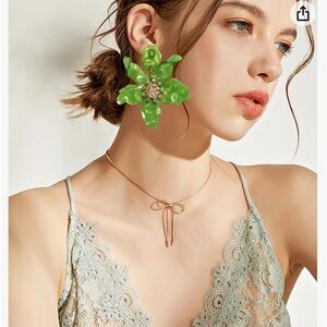 - Brand New Light Green Crystal Lily Button Earrings.